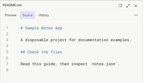 The same README in Source mode with Markdown syntax and line numbers.